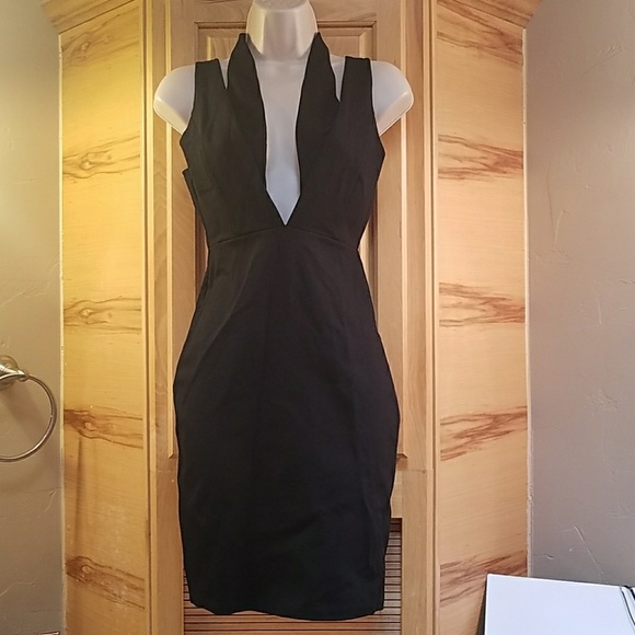 Solemio Dresses & Skirts - Solemio | Sexy low V black dress, Medium, NWT